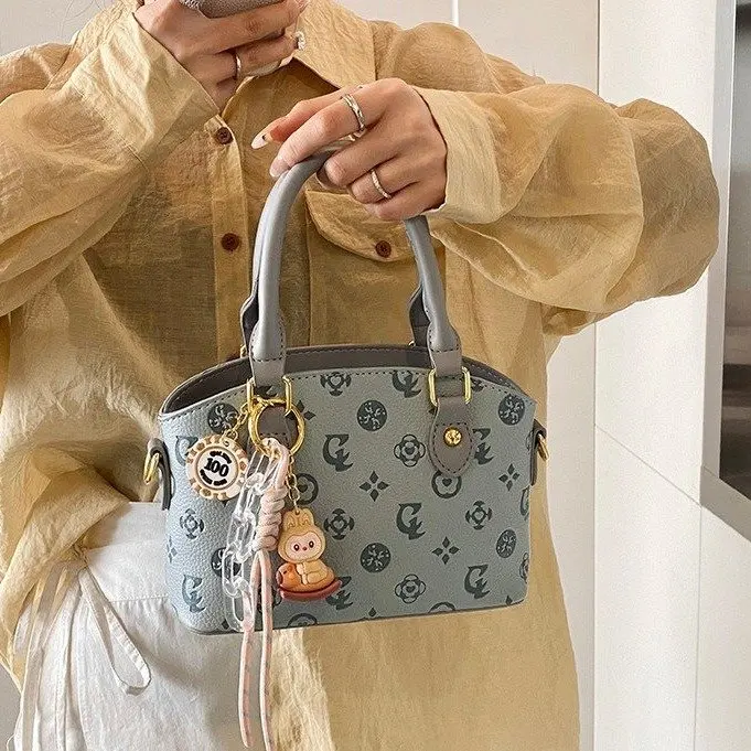 

Новая портативная женская маленькая сумка-сэтчел 2026 года, модная милая высококачественная сумочка, универсальная сумка через плечо для любого случая