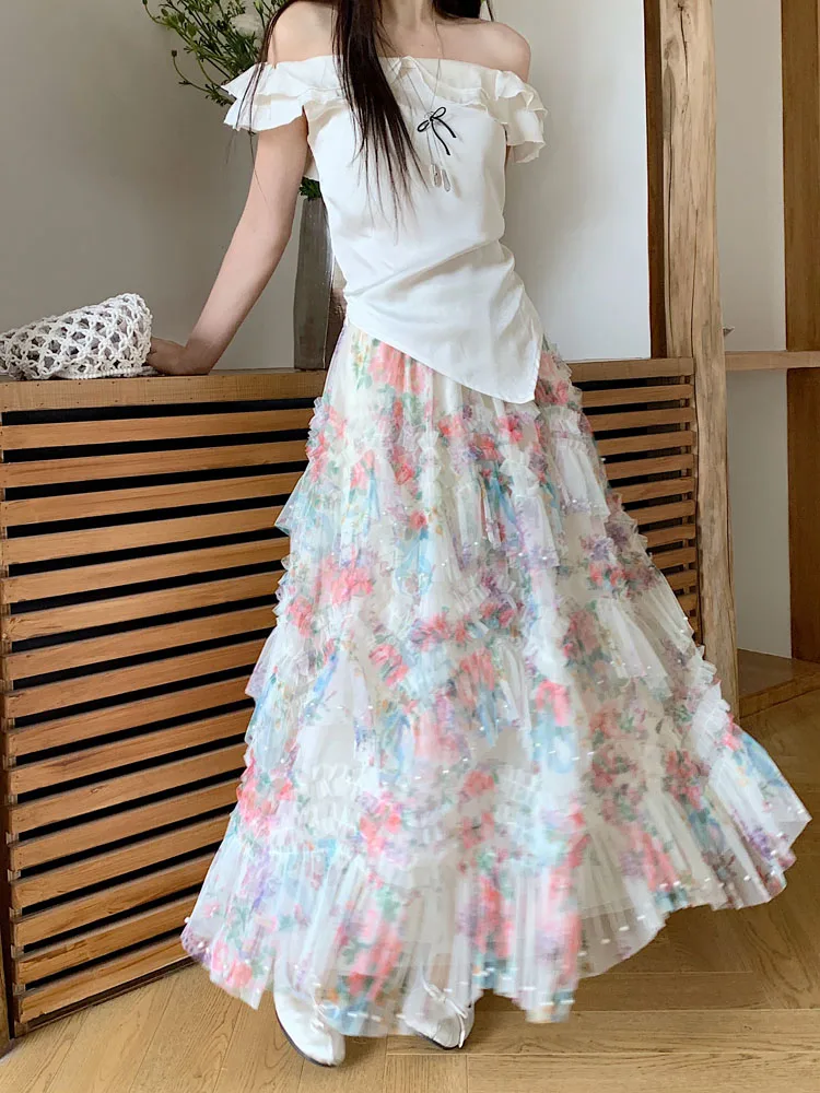 Perlenbesetzte unregelmäßige hohe Taille Rüschen Blumenröcke weiblich 2025, Sommer, Reisen, Urlaub, Datum, Party, knielanger Rock mit Blumendruck