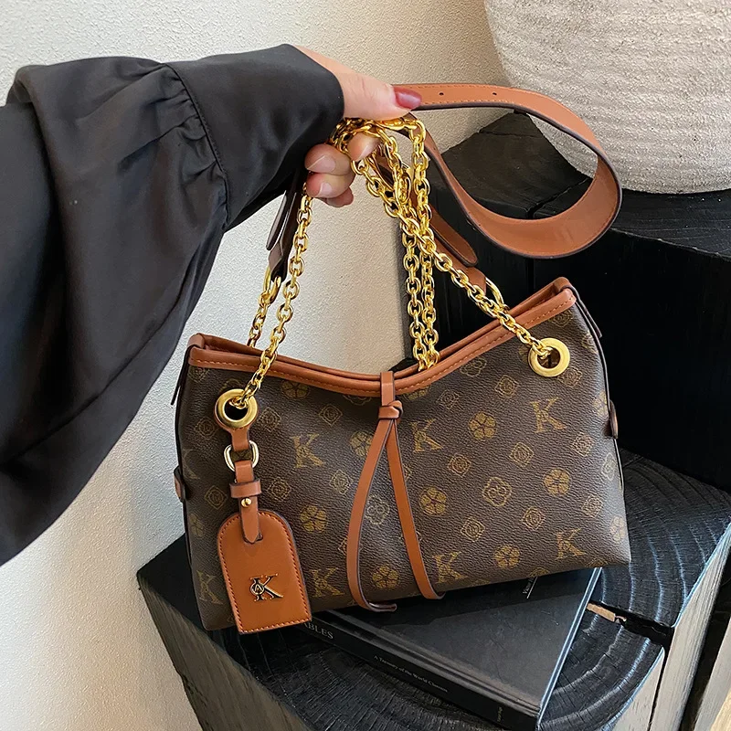 

2026 New Women's Retro Chain Bucket Bag - Premium Stylish Versatile Top-Handle Shoulder Crossbody for Daily Office Commute Baby