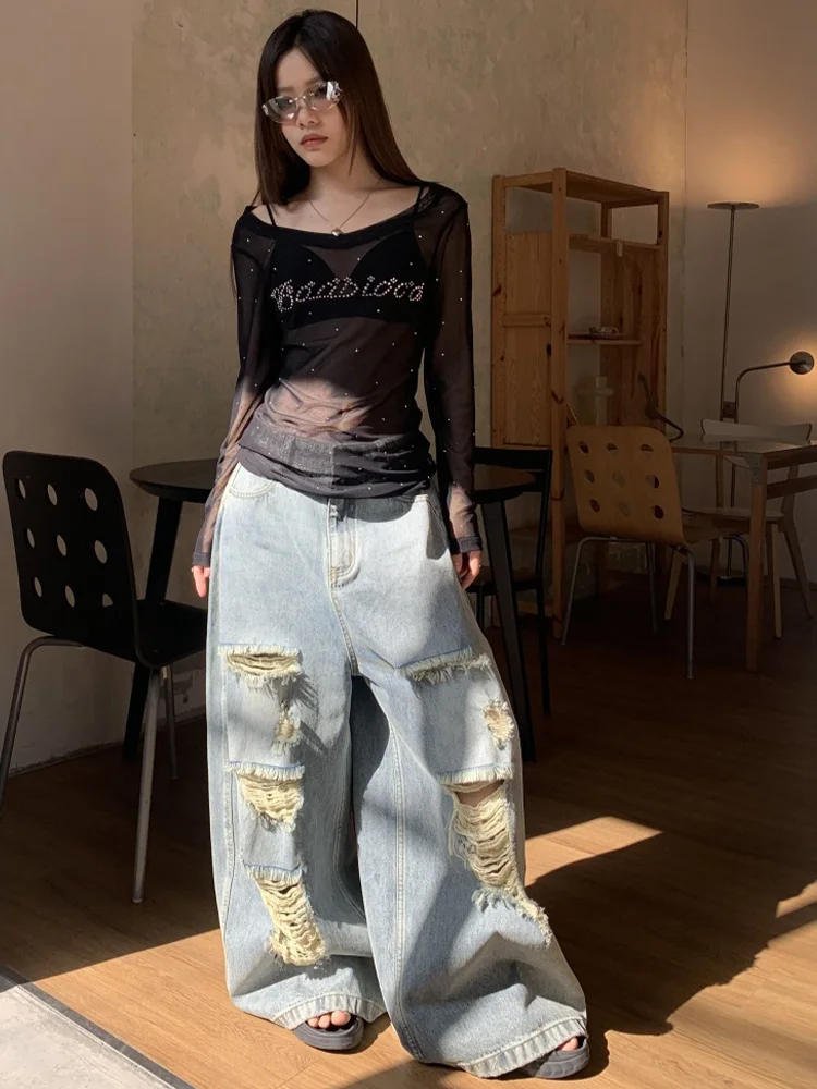 بنطلون جينز نسائي أمريكي عصري بمقاسات كبيرة، تصميم مثير مع فتحات، فضفاض وطويل يصل للأرض، يساعد على تنحيف الجسم