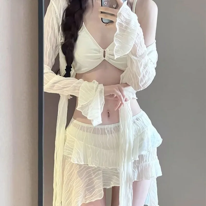 

Women's Beige Wave Textured Ruffle Hem 2 Piece Swimsuit Set with Tie Front Crop Top and Asymmetrical Skirt