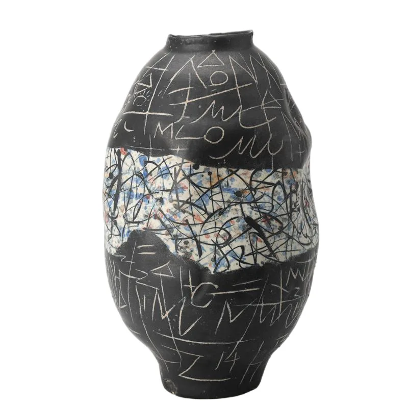 French medieval polka dot black ceramic vase