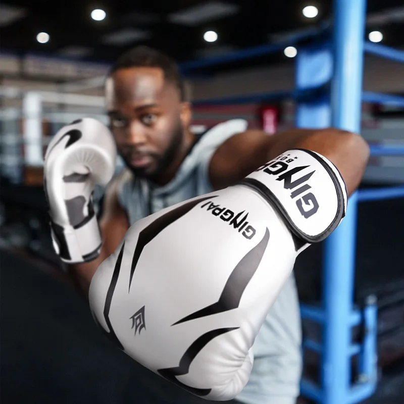 GINGPAI جودة عالية الكبار الطفل النساء/الرجال قفازات ملاكمة MMA الملاكمة التايلاندية Boxe De Luva Mitts Sanda معدات الصالة الرياضية 8 10 12 6 أوقية box