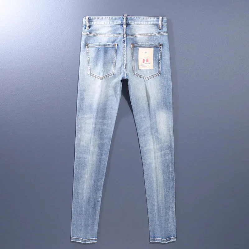 HombreFashion High Quality Men's Jeans Wrinkle Washed Nostalgic Stretch Slim Fit Perforated Light Blue Jeans Men's High Stree