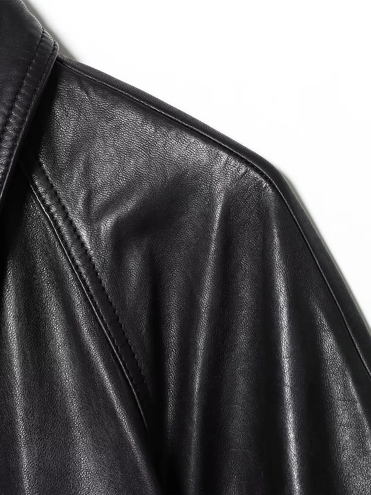 Estilo europeu novo feminino elegante e versátil cor sólida lapela manga comprida jaqueta de couro com cinto curto.