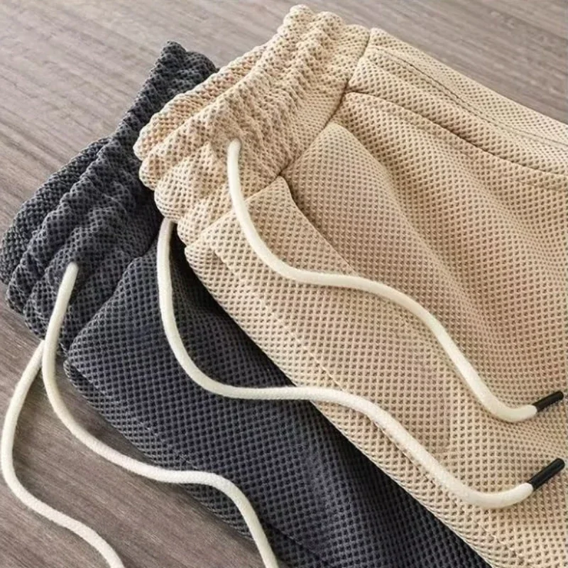 Pantalones cortos lisos con cordones para hombre, holgados, transpirables, informales, holgados, deportivos, hasta la rodilla, estilo japonés, Harajuku, culturismo, elegante