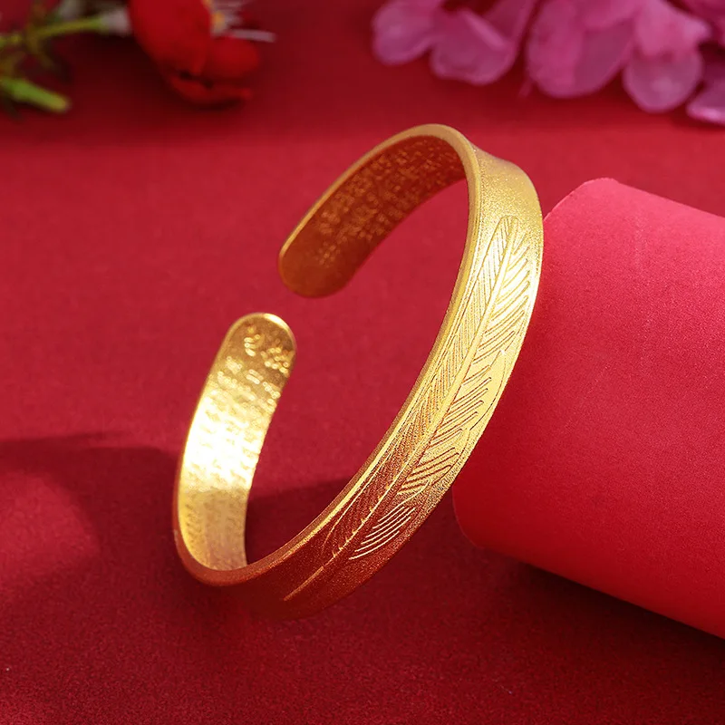 

AU999 24K Gold Feather Heart Sutra Bangle | 3D feather pattern with gilded scripture, enamel coloring, noble & refined