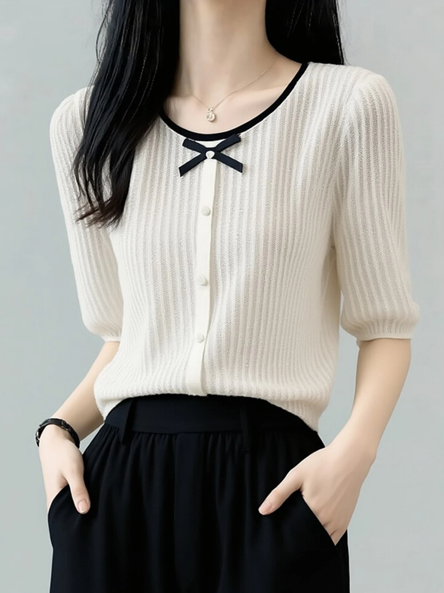 

Весенний модный вязаный свитер с коротким рукавом для женщин: мягкий, удобный, в корейском стиле, с уникальным цветовым блоком и индивидуальным дизайном.