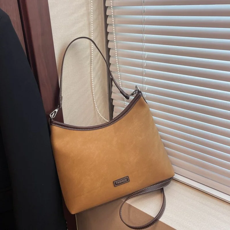 

Классическая элегантная женская сумка из высококачественной кожи, популярная винтажная повседневная сумка-тоут с простым дизайном, модная женская сумка большой вместимости.