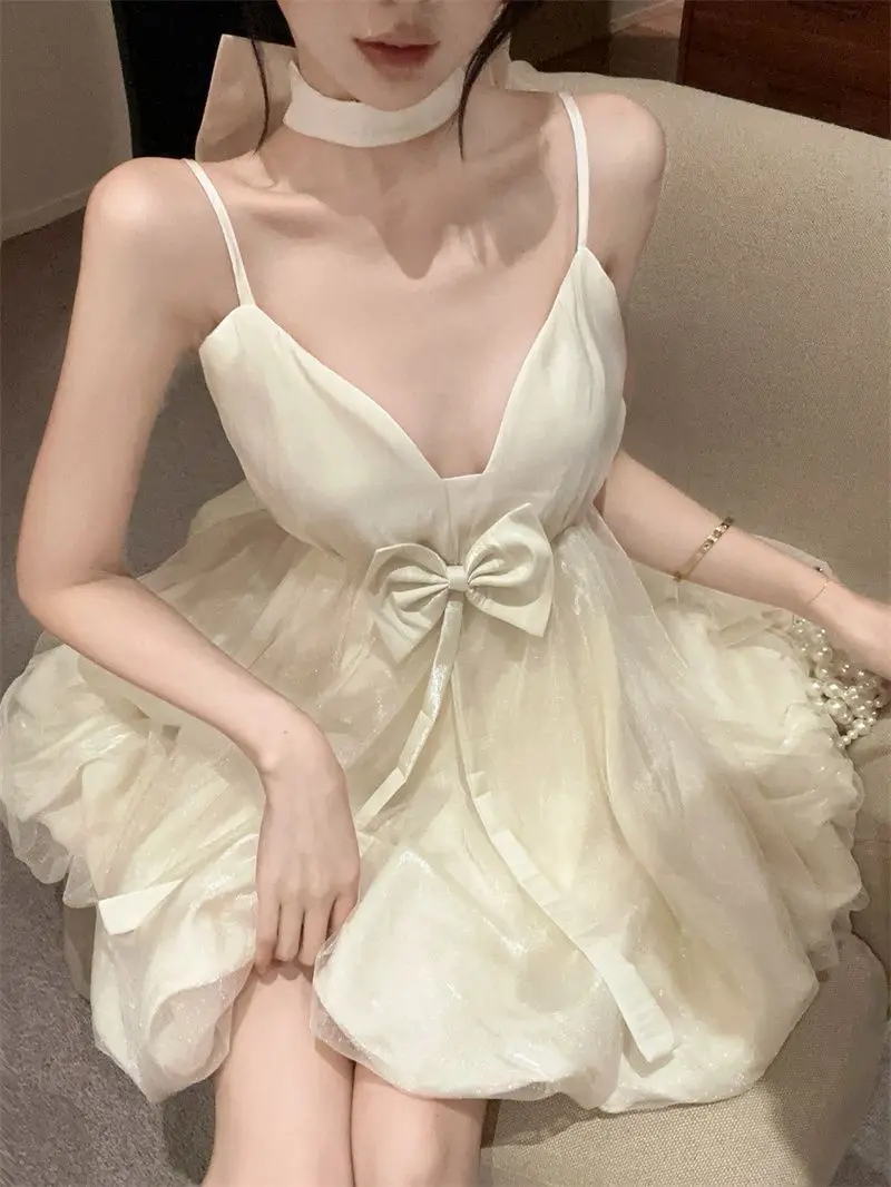 

Backless Bowknot Puff Dress Women Sleeveless Elegant Princess Style Fairy Tulle Mini Dress Summer Chic White Fashion Outfits New