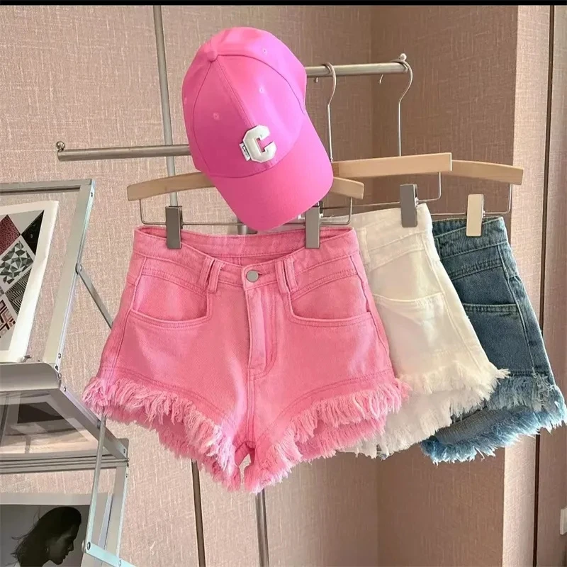 

Mid rise casual Hong Kong style ruffled fringe spicy girl denim shorts and hot pants, summer distressed and stylish 2024 pink
