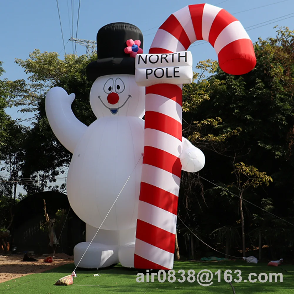 Muñeco de nieve helado inflable gigante para exteriores con bastón de caramelo, globo de dibujos animados de muñeco de nieve iluminado grande para decoración navideña