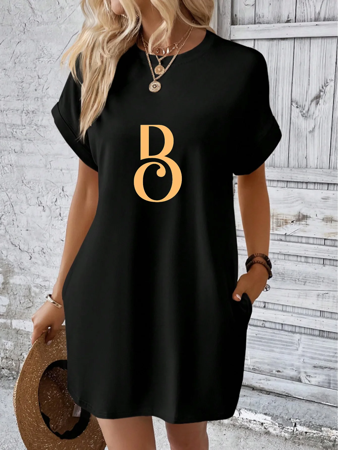 

Women's high-end black crew neck dress, premium Sorona fabric, with stylish gold letter "B" print.