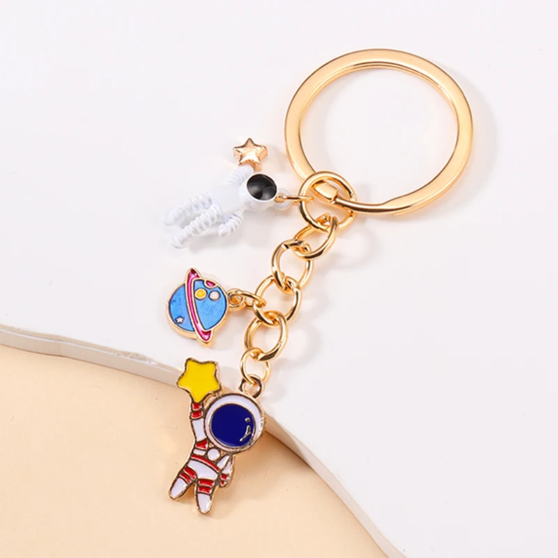 2023 Trendy Enamel Universe Planet Earth Key Chains Cute Astronaut Pendants Keychain For Men Boys Backpack Car Key Decor Jewelry