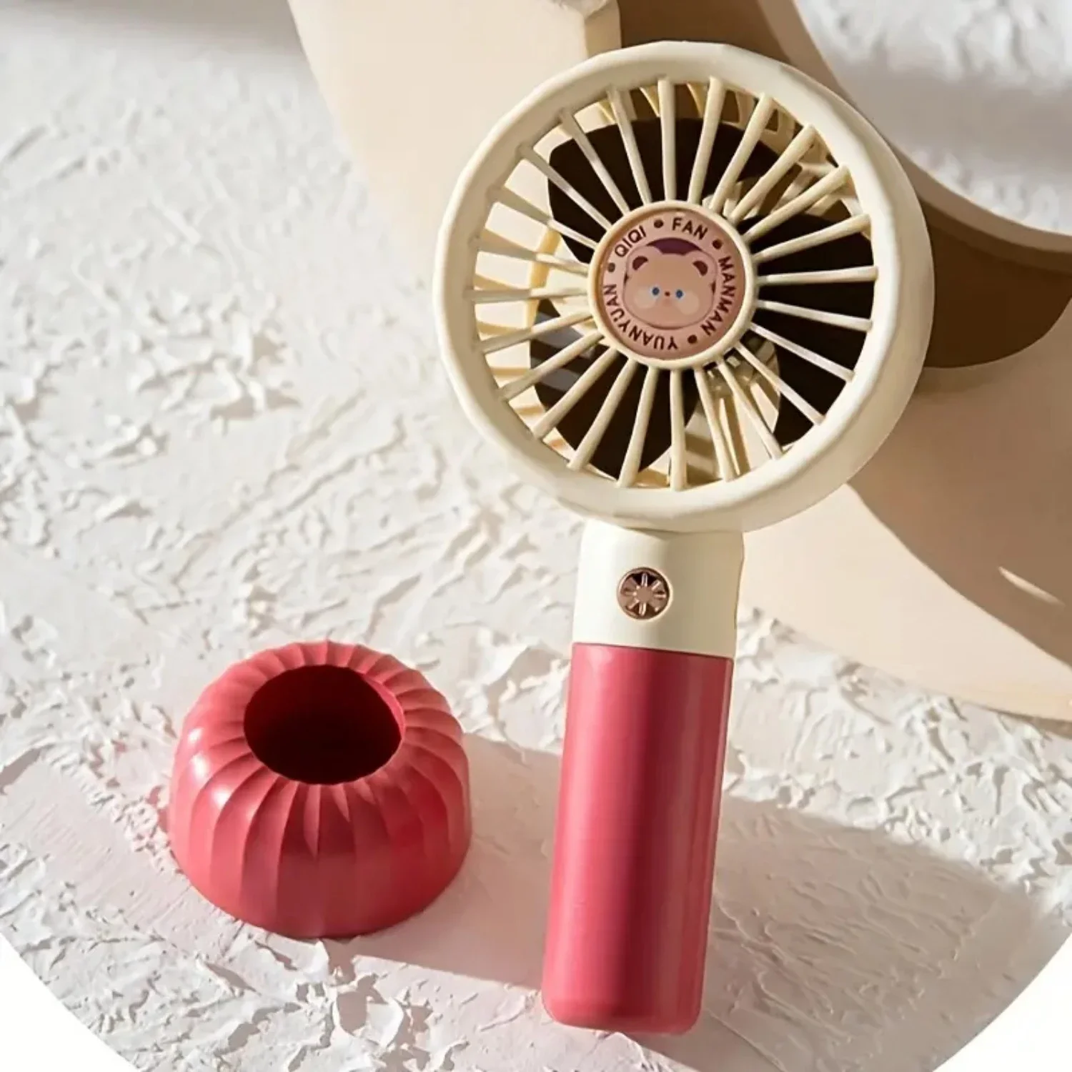 Stay cool on-the-go with this powerful, compact, and portable mini handheld fan. Ideal for staying comfortable while traveling,