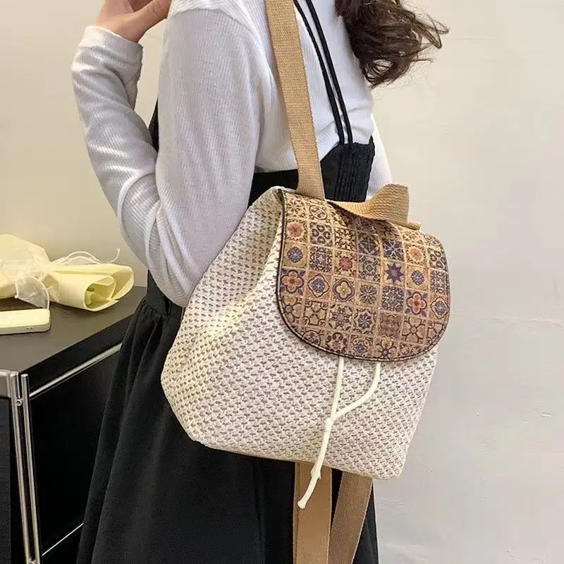 2023 New Seaside Summer Tassel Travel Vacation Woven Backpack Fashion Simple Art Handwoven Hollow Grass Woven Bag For Womem