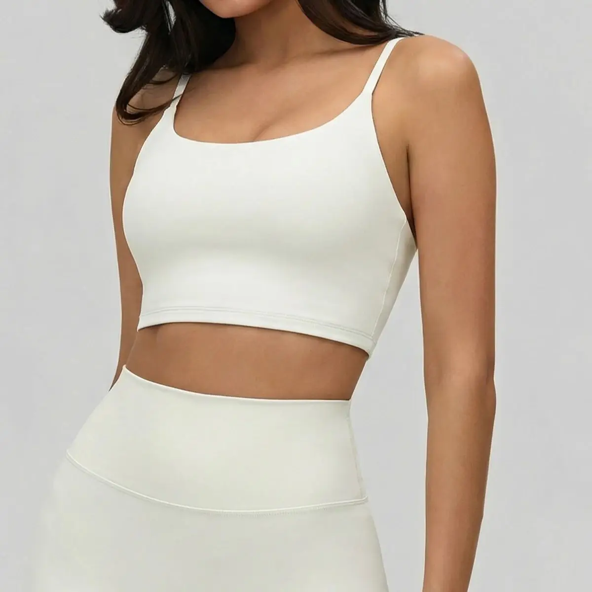 Women's stretch sports bra cami, long yoga tank, fitness crop top. U-shaped open back, removable padded cups.