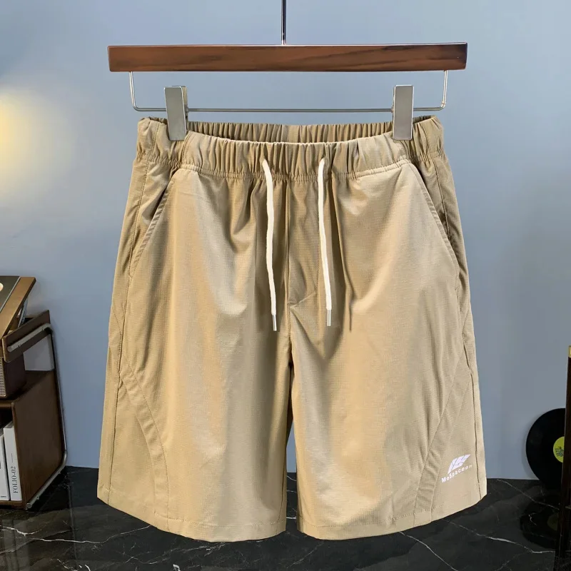 

Summer thin elastic waist ice silk breathable shorts for men 2026 new casual quick drying sports five quarter pants