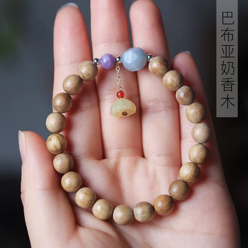 

Papuan milk fragrant wood DIY Ziqi Donglai 0.8×20 hand string bracelet men and women's style reading rosary decoration