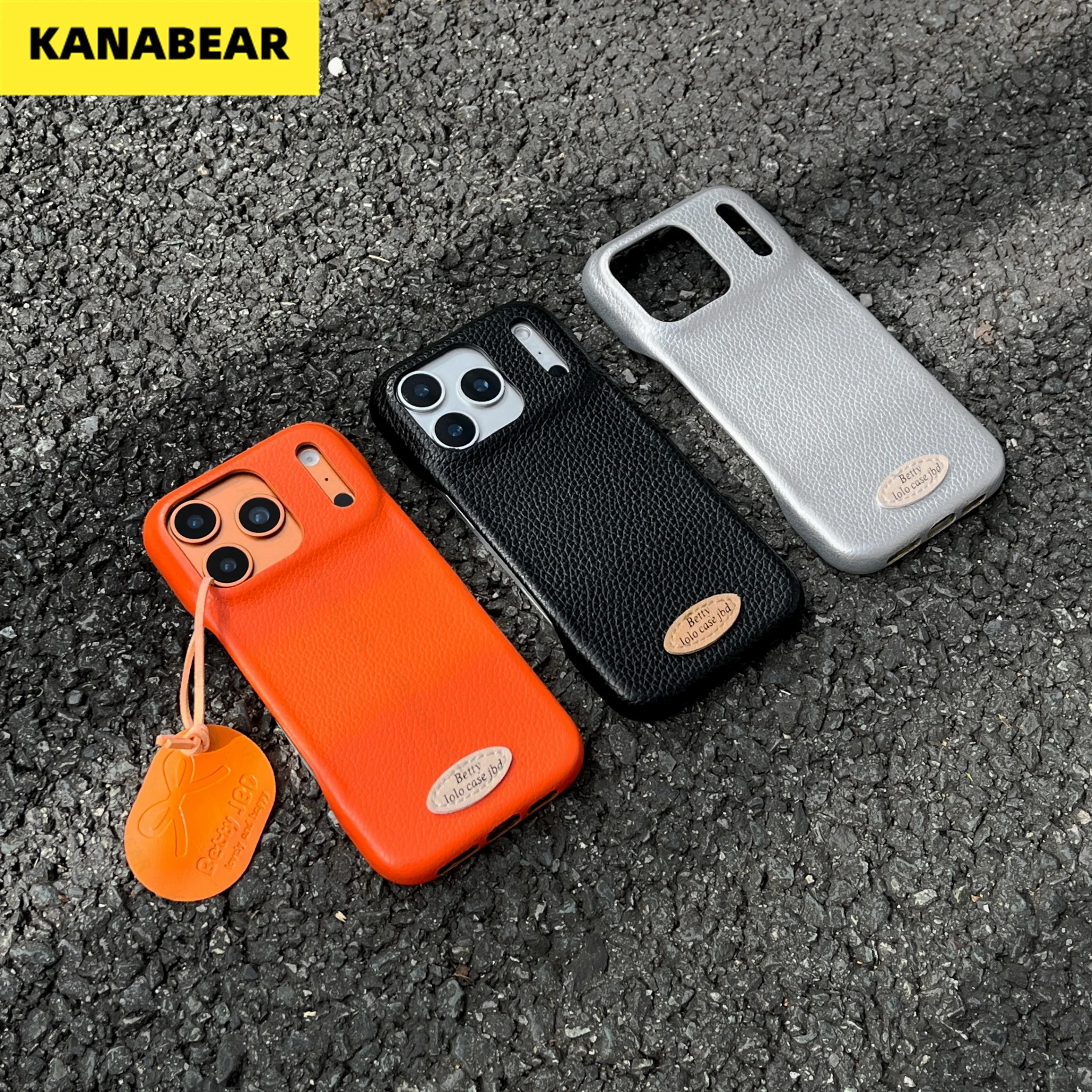 

The lychee-patterned leather minimalist label material + tag lanyard is suitable for the iPhone 17 phone case