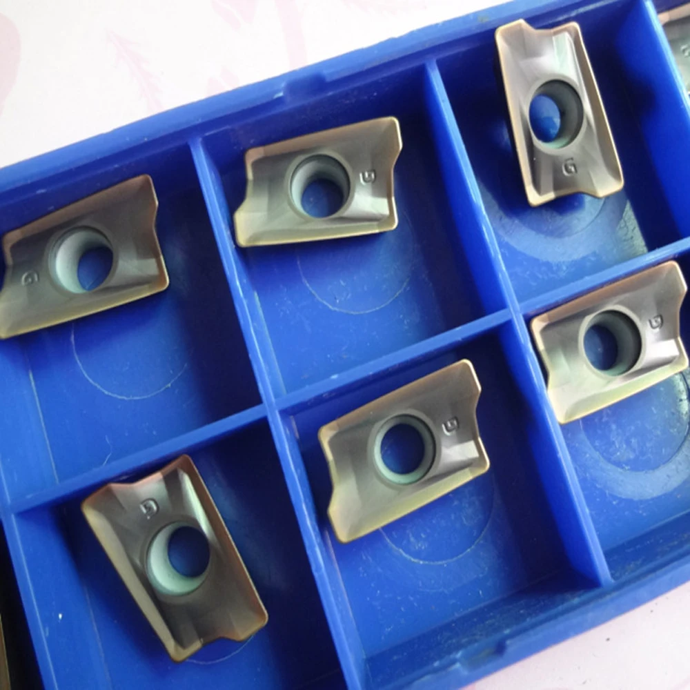 الأصلي يطير قواطع الطحن CNC بت AXMT170504PEER-G AXMT170508PEER-G ACP200 ACP300 ACK300 ACK200 مخرطة للمعادن الحديد الزهر
