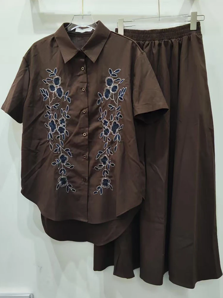 Camicia monopetto a maniche corte ricamata retrò primavera ed estate nuova + gonna in vita elastica abito a due pezzi da donna alla moda