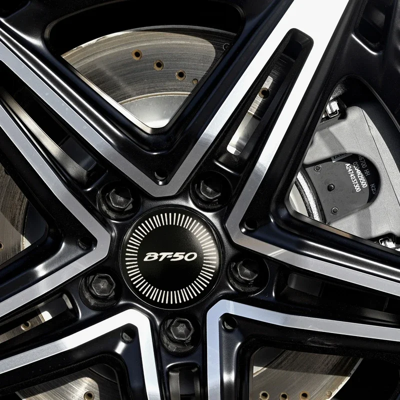 4 قطعة 56/60/65 مللي متر سبيكة سيارة محور عجلات مركز ملصقات لمازدا BT50 شعار AXELA CX-3 CX-4 CX-5 CX-9 CX-30 MPS MX-5 RX-7 Skyactiv