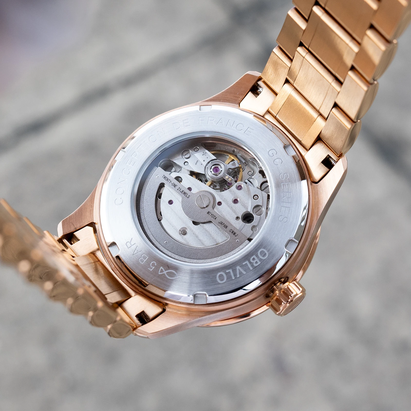 ساعة OBLVLO للرجال أنيقة باللون الذهبي الوردي ونجمة الأرض مع إطار ماسي ومينا أزرق وسوار أوتوماتيكي وسوار ساعة GC-D