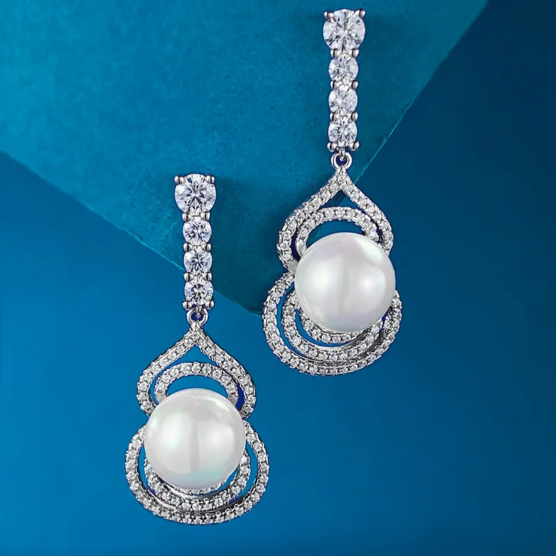 

2024 New S925 Pure Silver 10mm Imitation Pearl Shell Bead Gourd Earrings Earrings Earrings, Small and Elegant Style