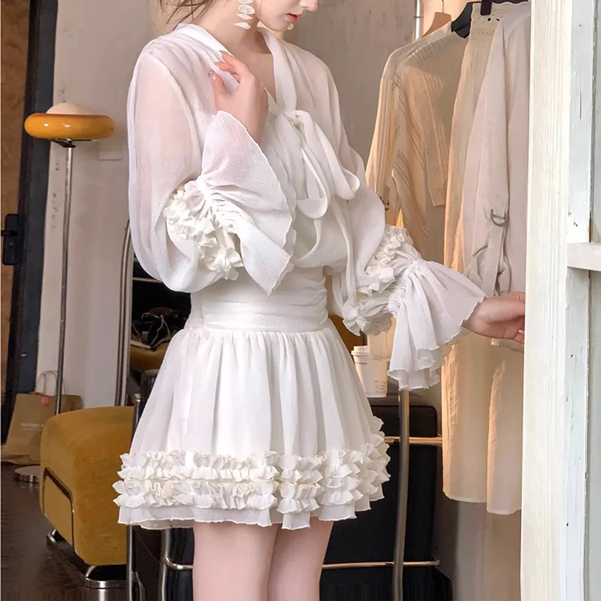 

2025 Fashion See Through Folds Mini Dress V-neck Bow Strap Three-dimensional Fungus Ruffles Flare Long Sleeve Holiday Dress