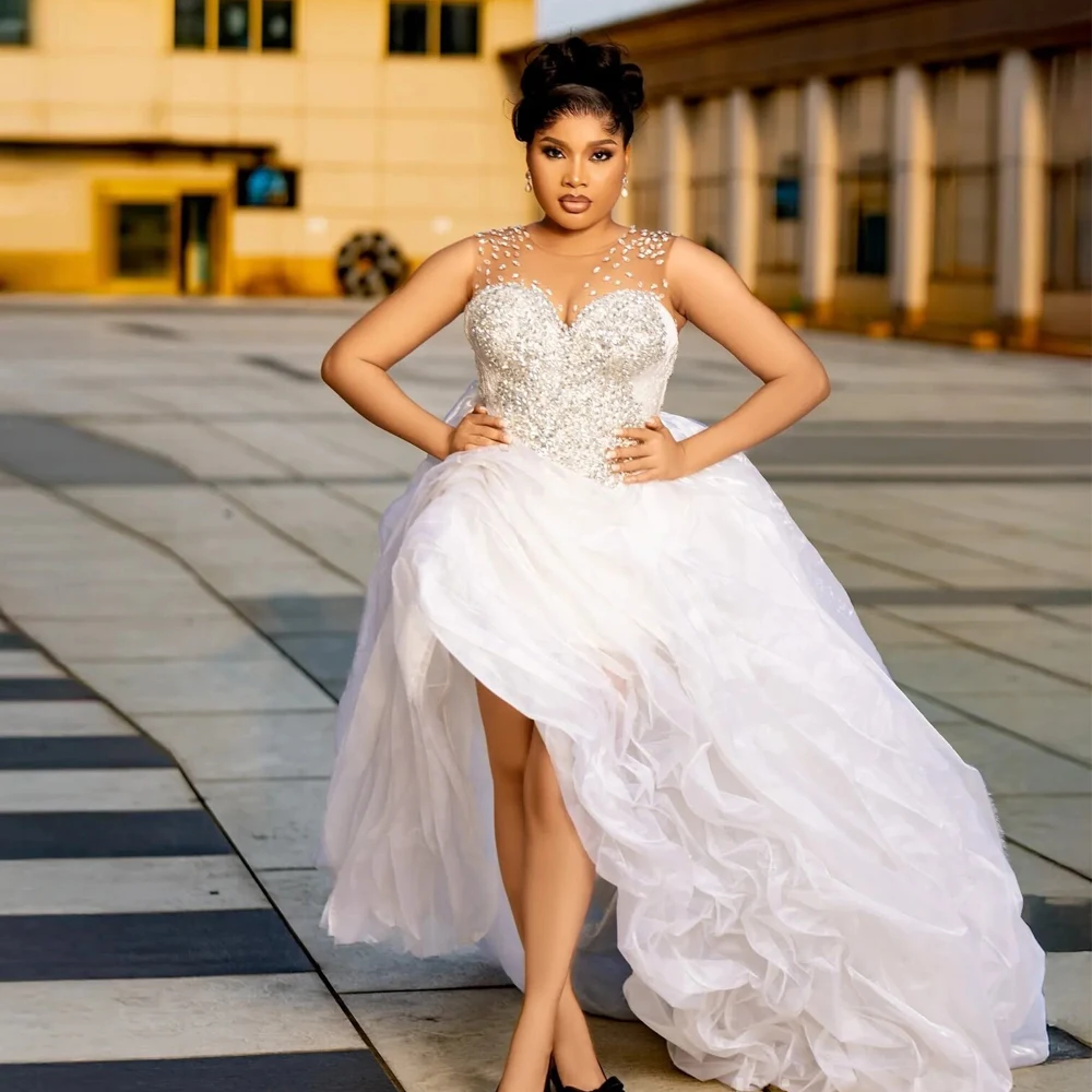 

Customized Rhinestone High Low Wedding Dresses O Neck Sleeveless High Low Bridal Gown Ruffles Asymmetrical Hem vestidos de novia