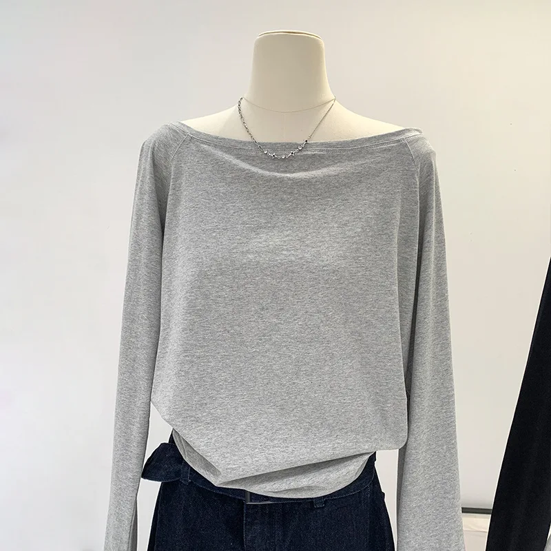 

One-word collar slanted shoulder top women's summer 2025 new niche leaking collarbone loose short-sleeved white T-shirt