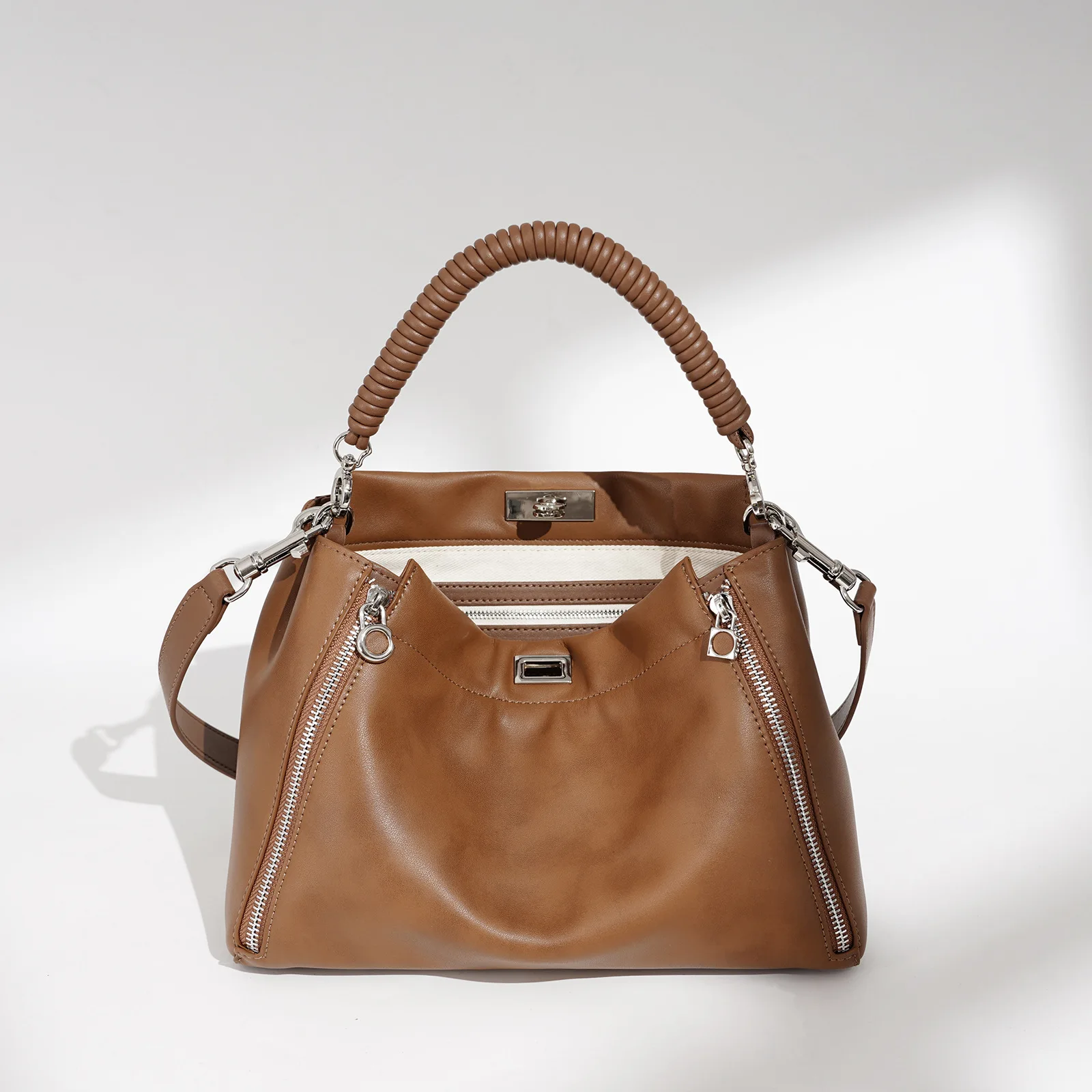 

Simple Yet Fashionable Messenger Purse For Women With Trendy Square Shape And Large Interior Includes Diaper Bag Use