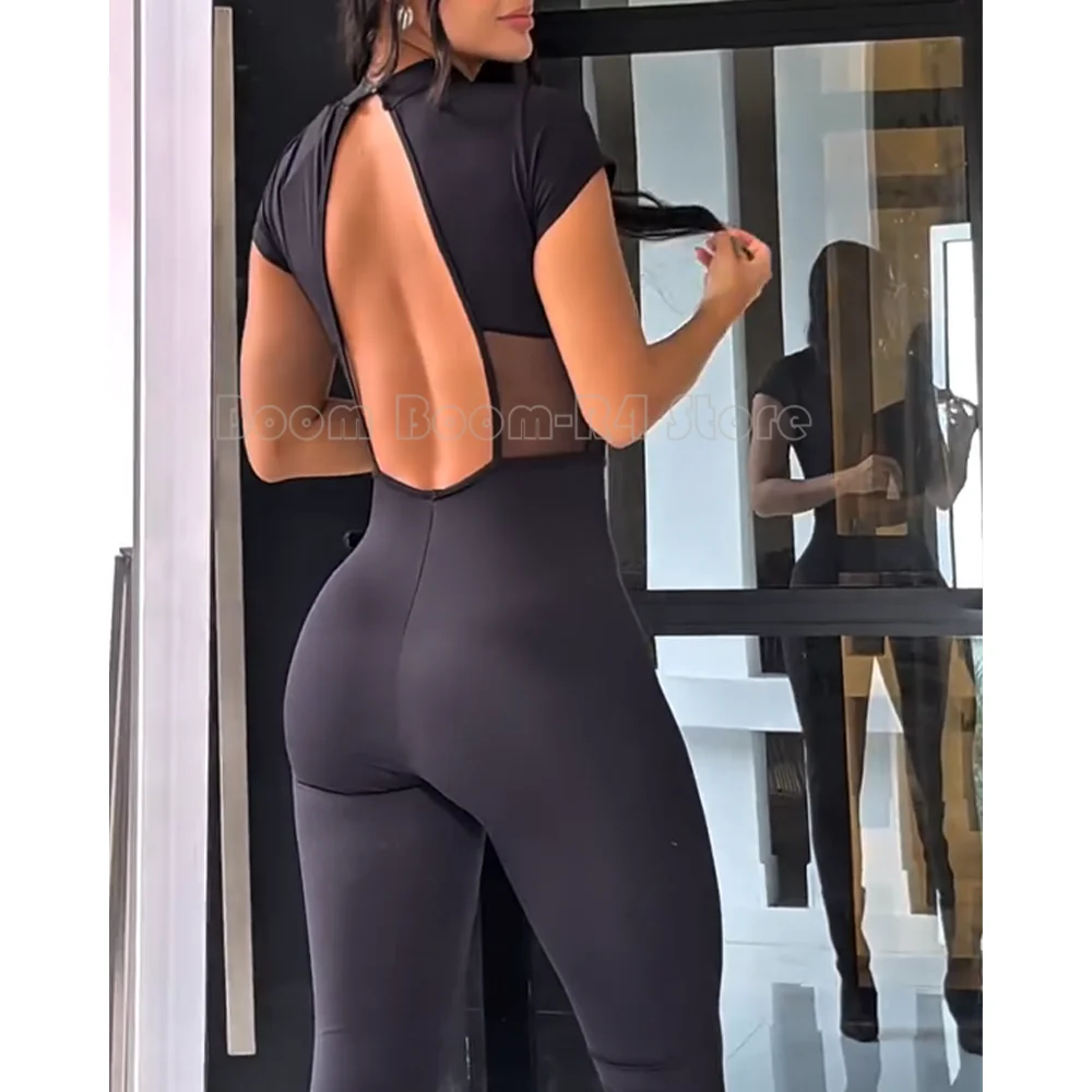 

Черный прозрачный сетчатый комбинезон с короткими рукавами, вырезом сзади, воротником-стойкой и облегающими ногами для клубов, вечеринок и вечеринок