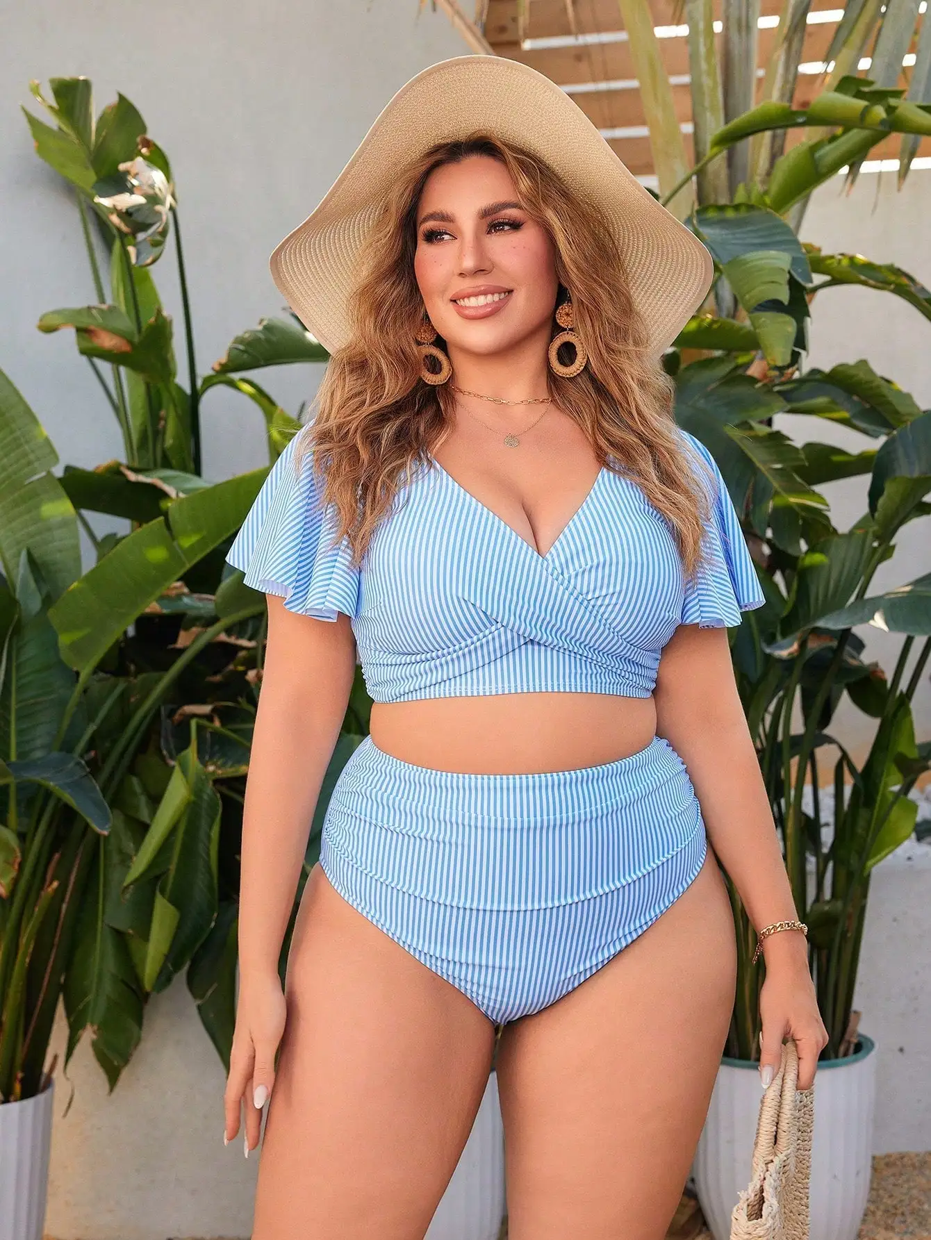 

High-Waisted Striped Two-Piece Swimsuit For Plus Size Women Featuring Ruffled Cap Sleeves And Crossed V-Neck Top