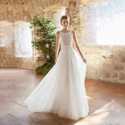 Affascinanti abiti da sposa in Tulle bianco abiti da sposa in pizzo abiti da sposa senza maniche 2024 abiti da sposa da spiaggia con scollo tondo Back Out