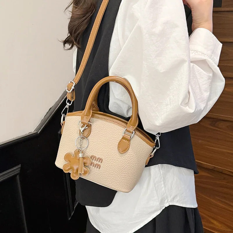 حقيبة يد جلدية أنيقة بتصميم كلاسيكي للنساء مع لون سادة وبسيط وتصميم عصري وحقيبة يد كروس فاخرة #2