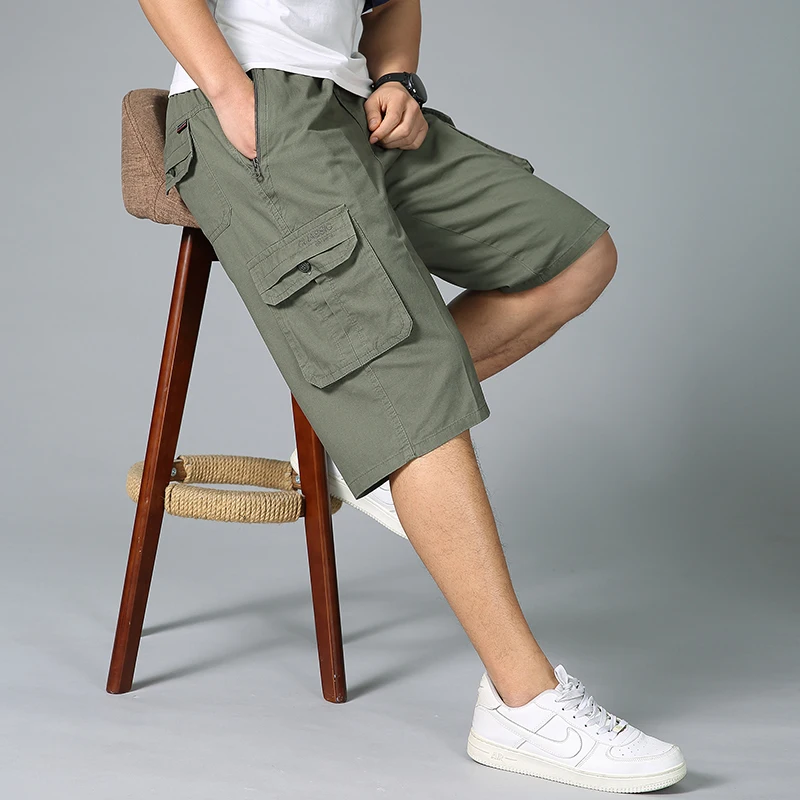 

Summer Men Oversized Shorts Outdoor Sports Solid Color Men Shorts New Loose Elastic Waist Straight Big Pocket Men Work Shorts