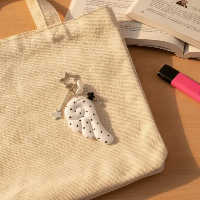 Y2K Sterne Flügel Schlüsselanhänger Anhänger Niedliche Taschenhänger Schwarz-Weiß Engel Dekoration Accessoires Geschenk – Detail 1