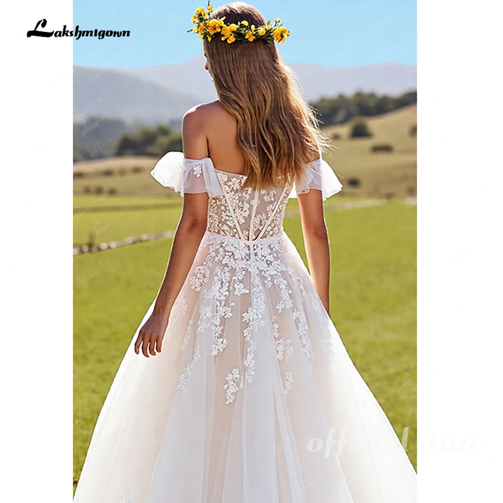 Lakshmigown قبالة الكتف ألف خط زين العاج مشد فستان الزفاف يزين الدانتيل مخصص فساتين الزفاف البلد