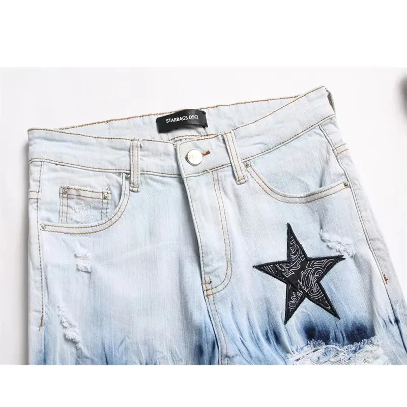 جينز رجالي بتصميم إيطالي Ami3091 بنطال جينز ممزق ومطرز على شكل نجمة خماسية مرن ونحيف للقدم سراويل رجالية مناسبة تمامًا