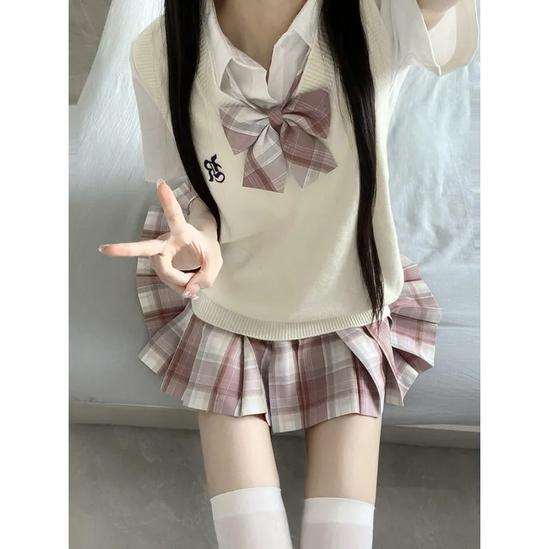 Original by Kongli Shu WanjkUniform vest, waistcoat, shirt, Japanese college stylejkPlaid skirt and pleated skirt layered outfit