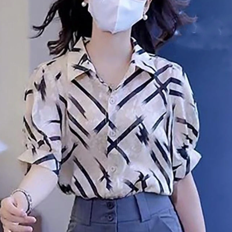 2024 New Korean Commuter Minimalist Fashion Loose Short Sleeved Blouses Polo Collar Printed Stripe Button Women\'s Shirt Top