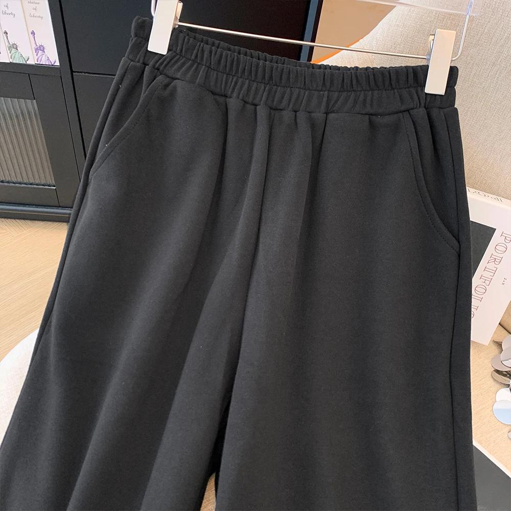 Pantaloni larghi e comodi da pendolarismo casual autunnali da donna taglie forti Tasche nere elastico in vita semplici pantaloni lunghi a gamba dritta grandi