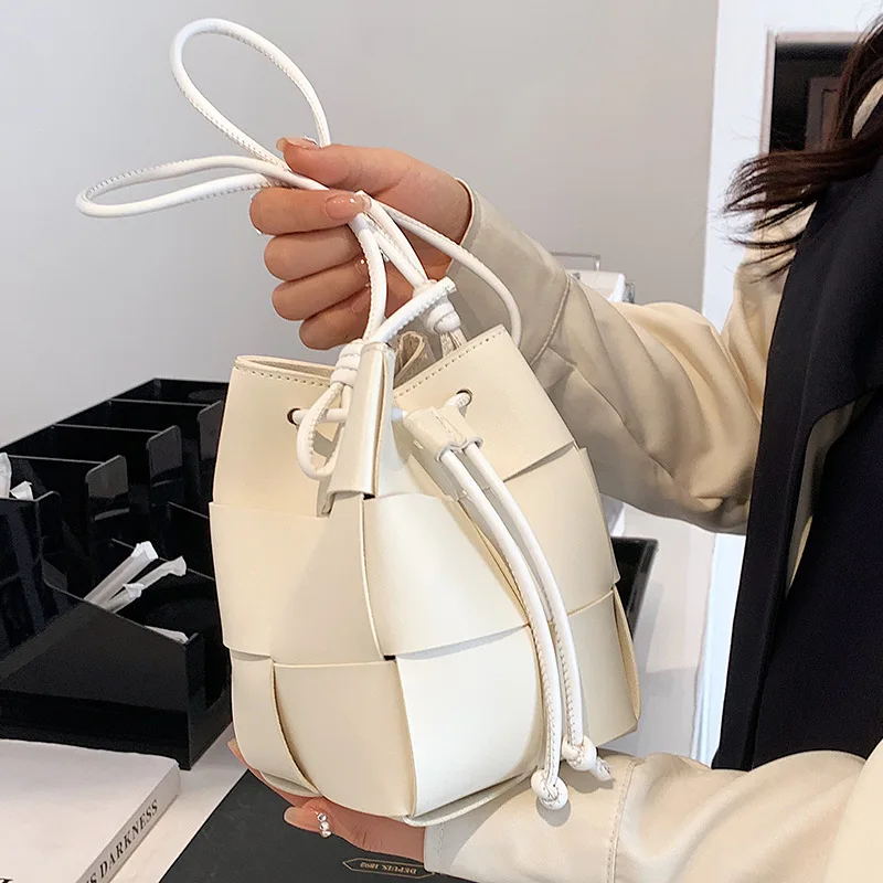 PU Hollowed Out Handbags Drawstring Fashionable Shoulder Crossbody Bucket Bag Portable PU Hollow Ins Shoulder Bucket Bag Girl