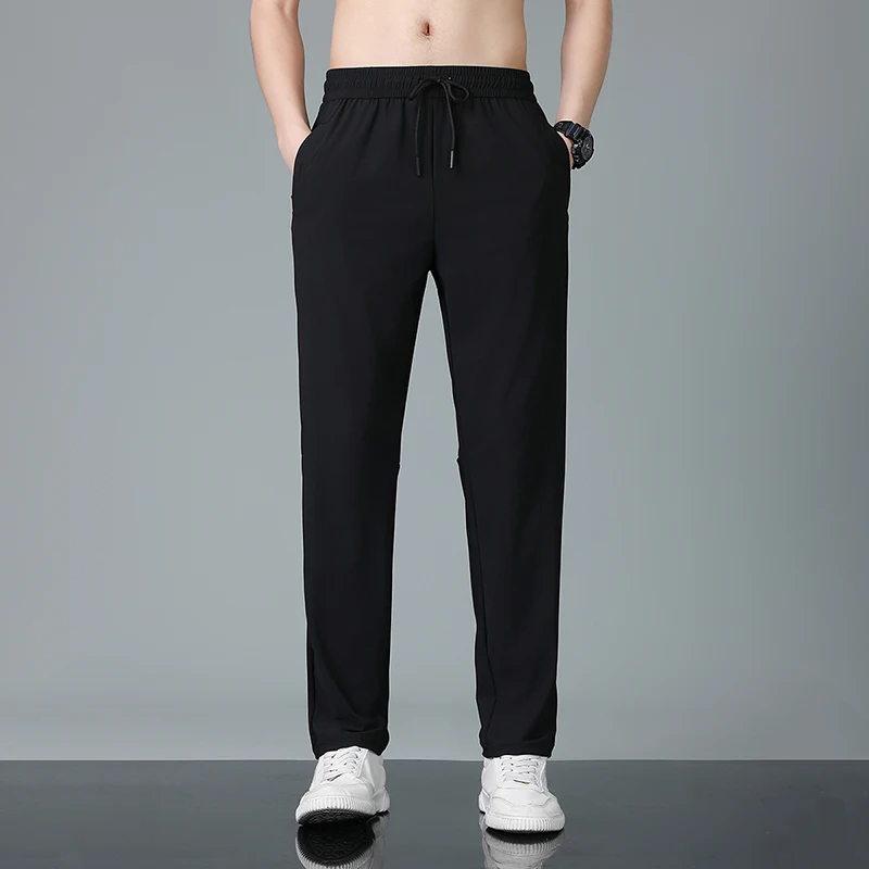 

Summer Cool Breathable Sweat Absorbing Quick Drying Elastic Slim Fitting Trendy Versatile Pants Men Ice Silk Sports Casual Pants
