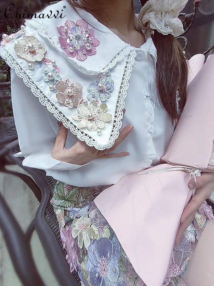 Camicia arruffata con fiore colorato di cristallo tridimensionale della linfa dell\'industria pesante autunno camicetta a maniche lunghe dolce di