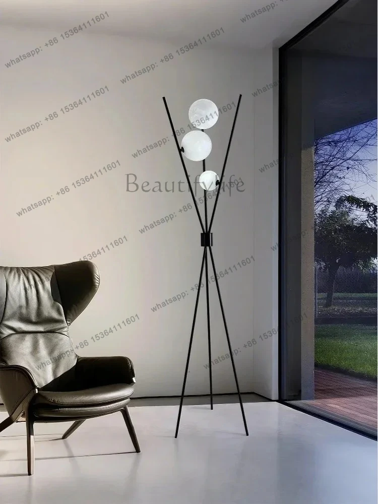 

Tripod floor lamp moon design sense Nordic light luxury minimalist living room sofa bedroom floor lamp