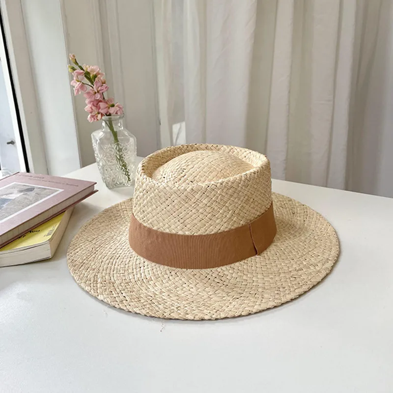 Pure hand-woven raffia flat cap simple fashion color ribbon women\'s hat outdoor beach travel sun hat wholesale spot