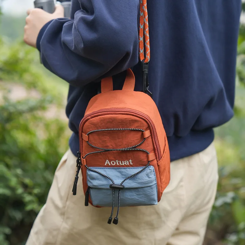 Outdoor trendy brand functional color-blocking crossbody bag for men and women, lightweight multi-pocket shoulder bag, portable